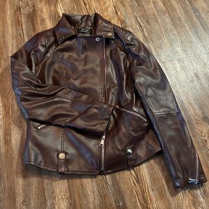 Women’s size Small. Maroon fake leather jacket. NWOT.